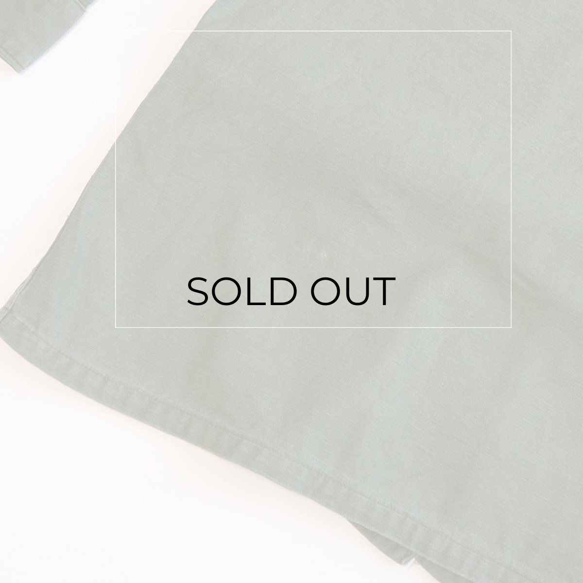 背中左下付近にうっすら汚れ