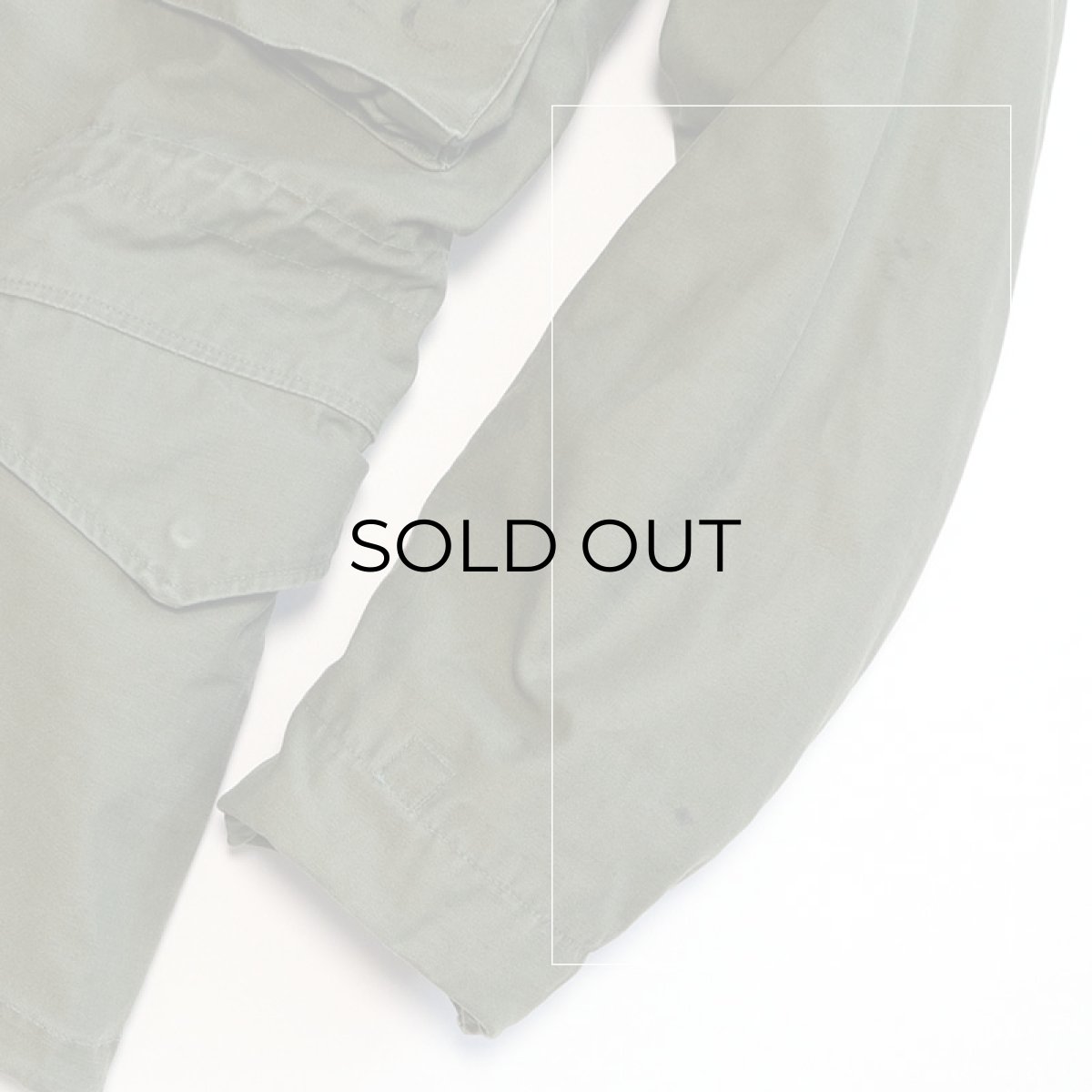 左袖肘付近に汚れ